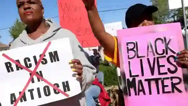 Protest Against California Police Officers Arrested By FBI [Photo: The Guardian]