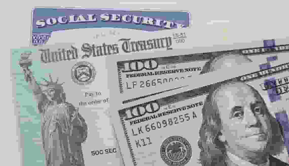 Social security card, Treasury check and USA 100 dollar bills