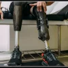 Health insurers place restrictions on coverage for prosthetic limbs, raising doubts about their medical necessity